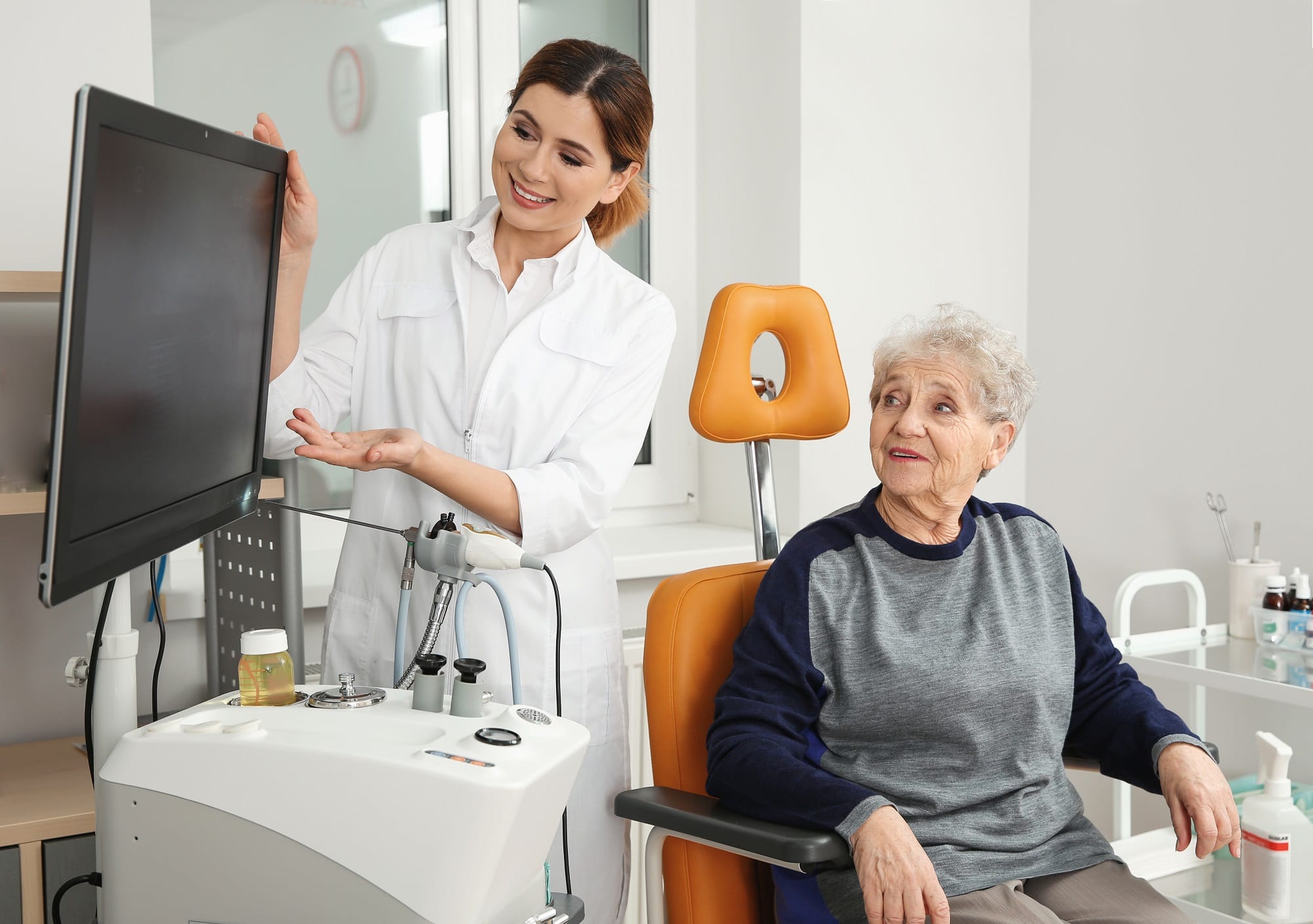 Senior Woman Visiting Professional Otolaryngologist In Clinic. Hearing Disorder