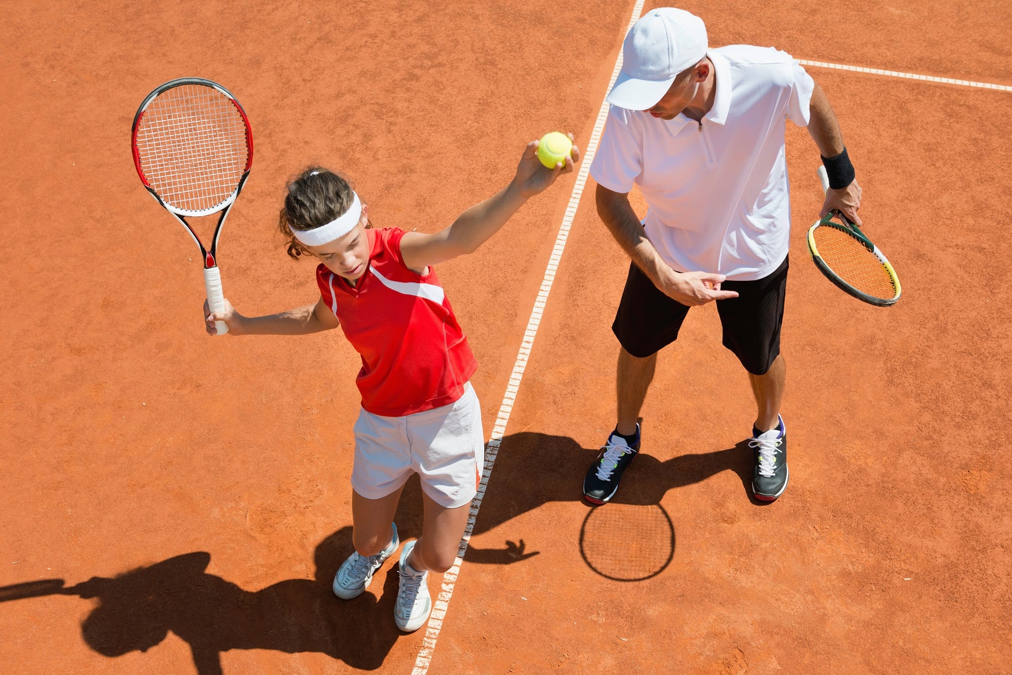 Practicing Tennis Service