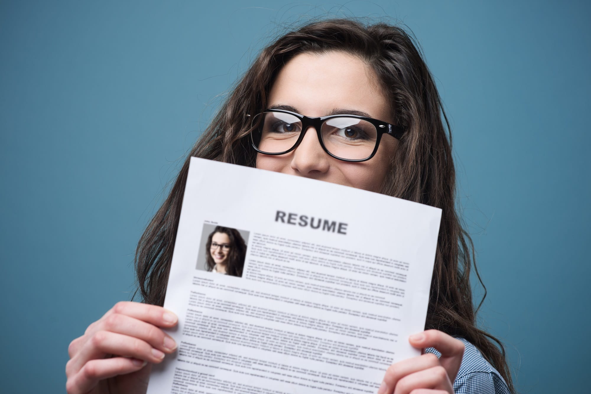 Young Woman Holding Her Resume