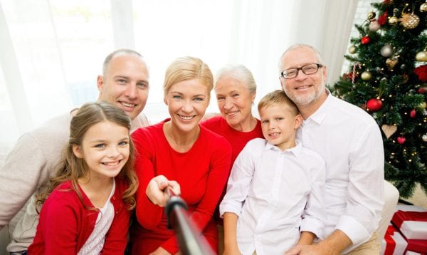 Smiling Family Making Selfie At Home