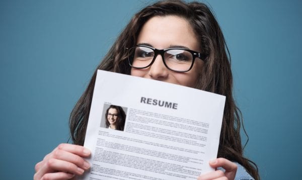 Young Woman Holding Her Resume