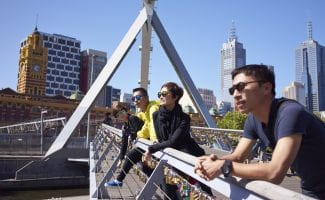 Travelers On Bridge