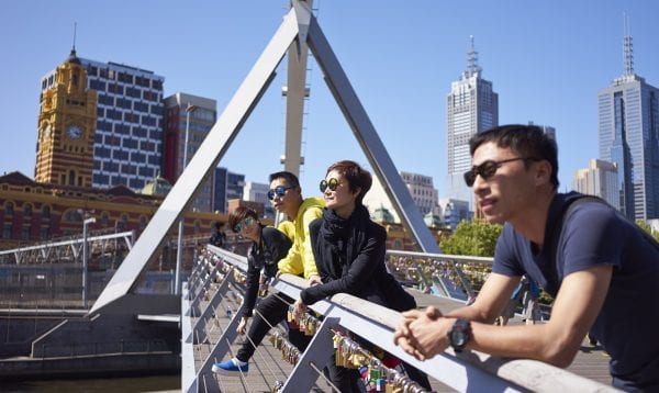 Travelers On Bridge